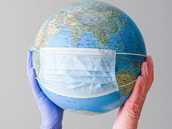This is a globe wearing a face mask.