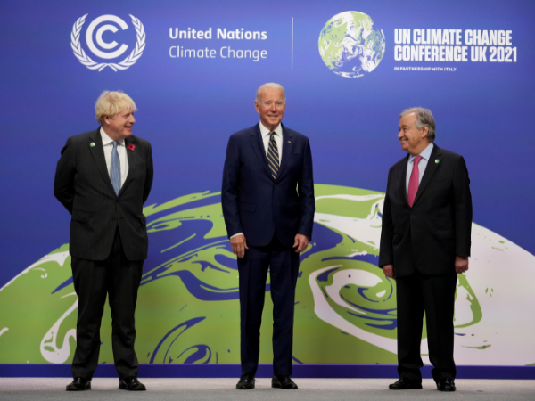 Biden tells leaders US will fulfill climate goals as agenda falters at home