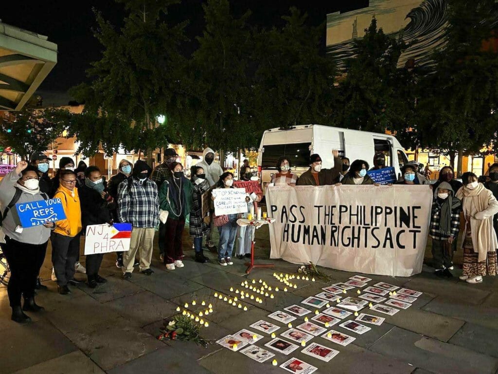 Activist holding a human rights vigil in Jersey City. CONTRIBUTED