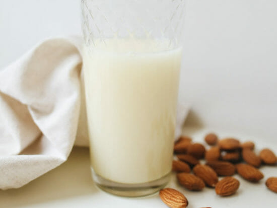 a glass of milk with almonds