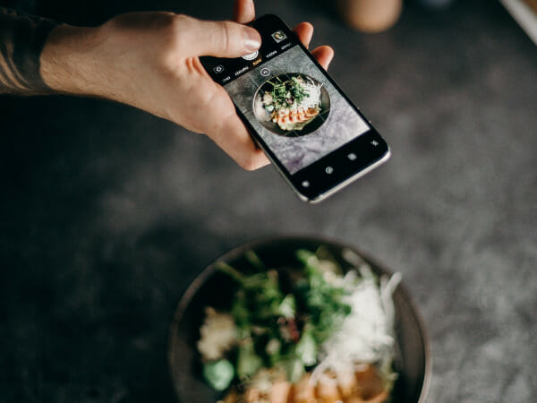This is a person taking a photo of their food.