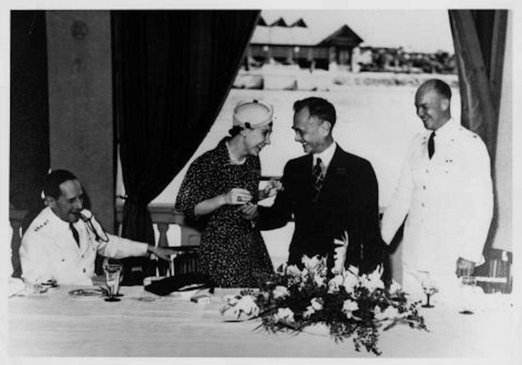 Luncheon honoring Dwight Eisenhower hosted by Philippine President Manuel Quezon. Left to Right: General Douglas MacArthur, Mamie Eisenhower, Manuel Quezon, and Dwight D. Eisenhower, Manila, Philippines. 1939.