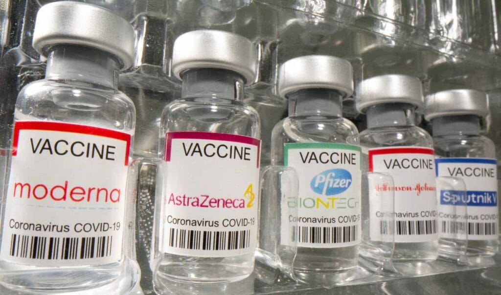 Vials labeled "Moderna, AstraZeneca, Pfizer - Biontech, Johnson&Johnson, Sputnik V coronavirus disease (COVID-19) vaccine" are seen in this illustration picture taken May 2, 2021. REUTERS
