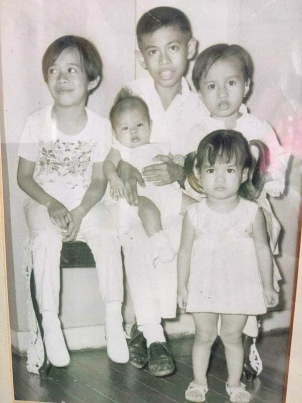 Jean Enriquez's late brother, Josemari aka Kristo, with his siblings. CONTRIBUTED