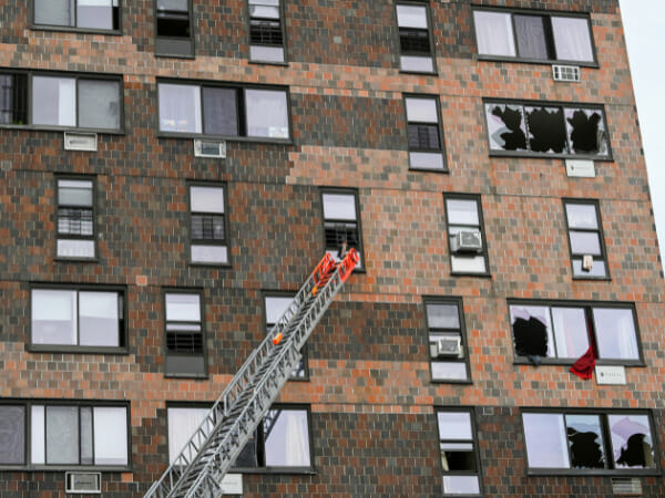 19 killed including nine children as sparks fire in NYC building