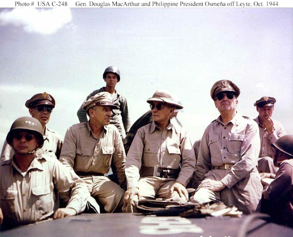 In this World War II photograph President Sergio Osmena is seated close to General Douglas MacArthur during the landing in Leyte.