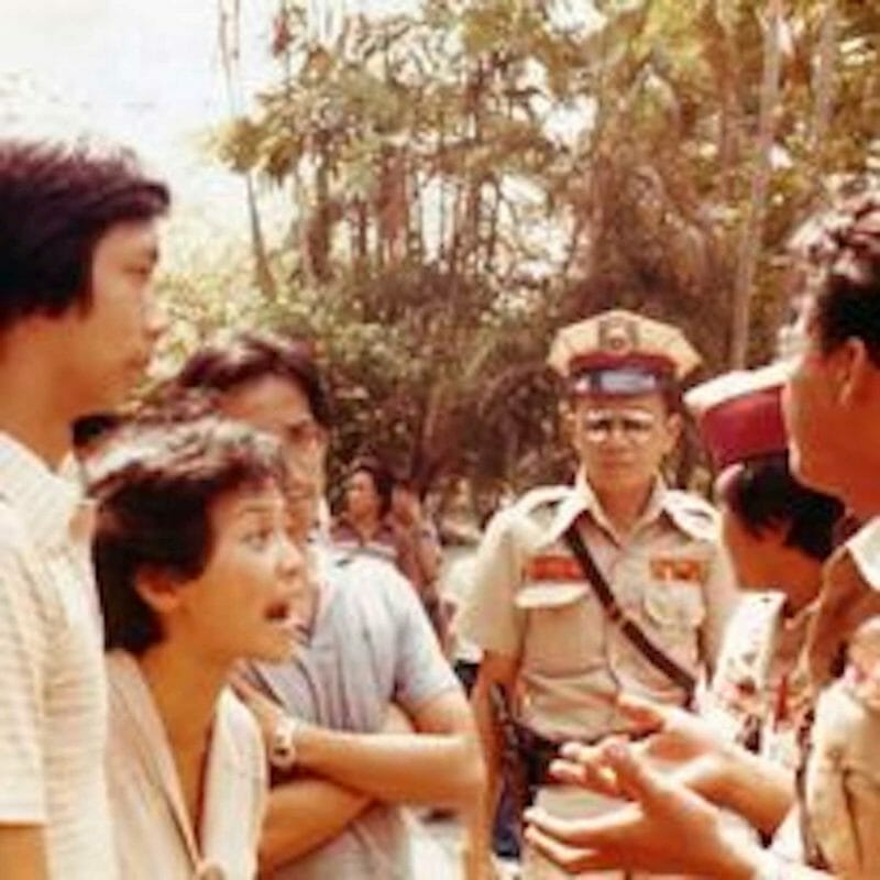 A young Lisa Dacanay confronting policemen. CONTRIBUTED