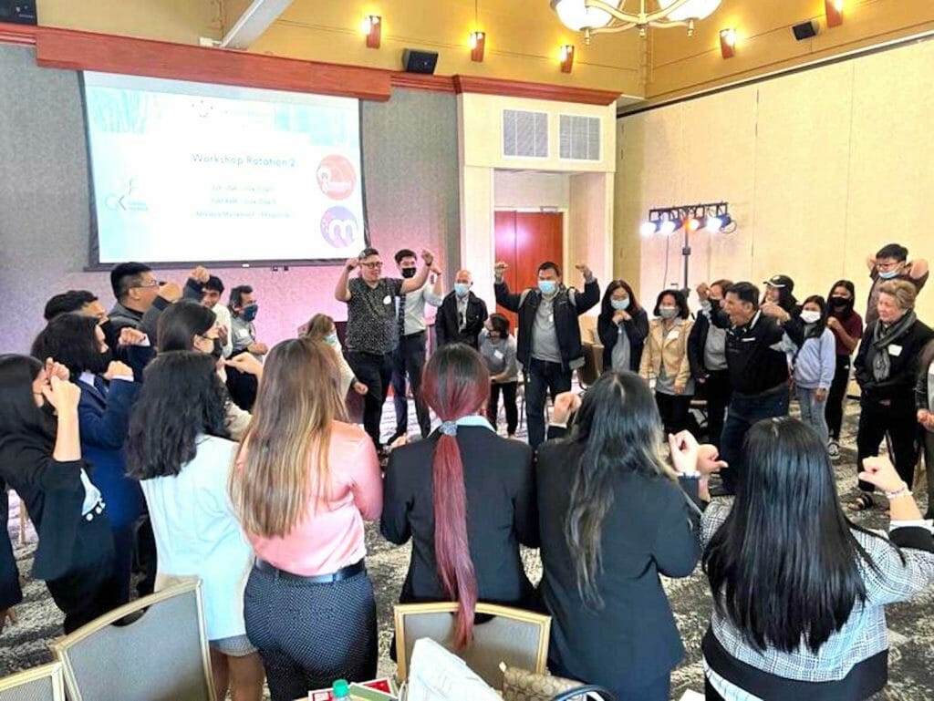 Gawad Kalinga speaker Francis Miranda leads a group activity during his workshop at the Live Oak Event Center in Orlando, Florida. AMIR OMAR