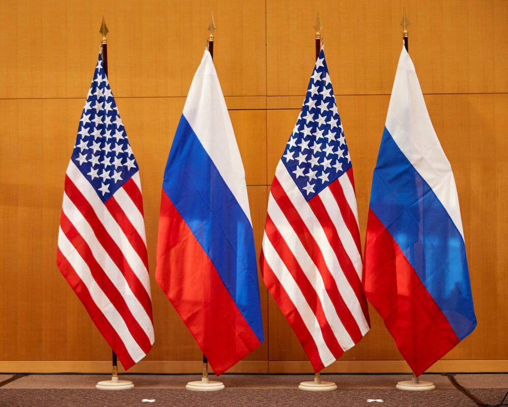 Russian and U.S. flags are pictured before talks between Russian Deputy Foreign Minister Sergei Ryabkov and U.S. Deputy Secretary of State Wendy Sherman at the United States Mission in Geneva, Switzerland January 10, 2022. REUTERS/Denis Balibouse