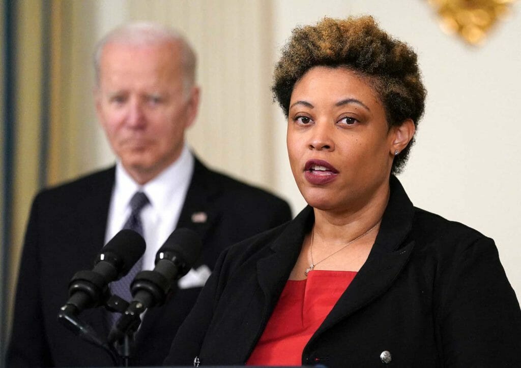 Office of Management and Budget (OMB) Director Shalanda Young speaks as U.S. President Joe Biden listens prior to announcing his budget proposal for fiscal year 2023, during remarks in the State Dining Room at the White House in Washington, U.S., March 28, 2022. REUTERS/Kevin Lamarque