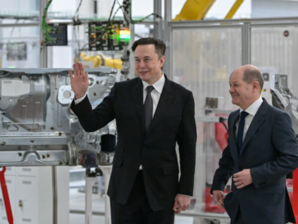 Dancing Elon Musk hands drivers first Teslas from new German factory