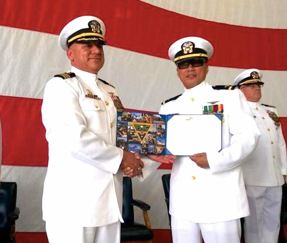 A formal U.S. Navy ceremony honored retiring Filipino Chief Warrant Officer Jules R. Amores (right) on March 25 at the Naval Station in Lemoore, California. SCREENSHOT