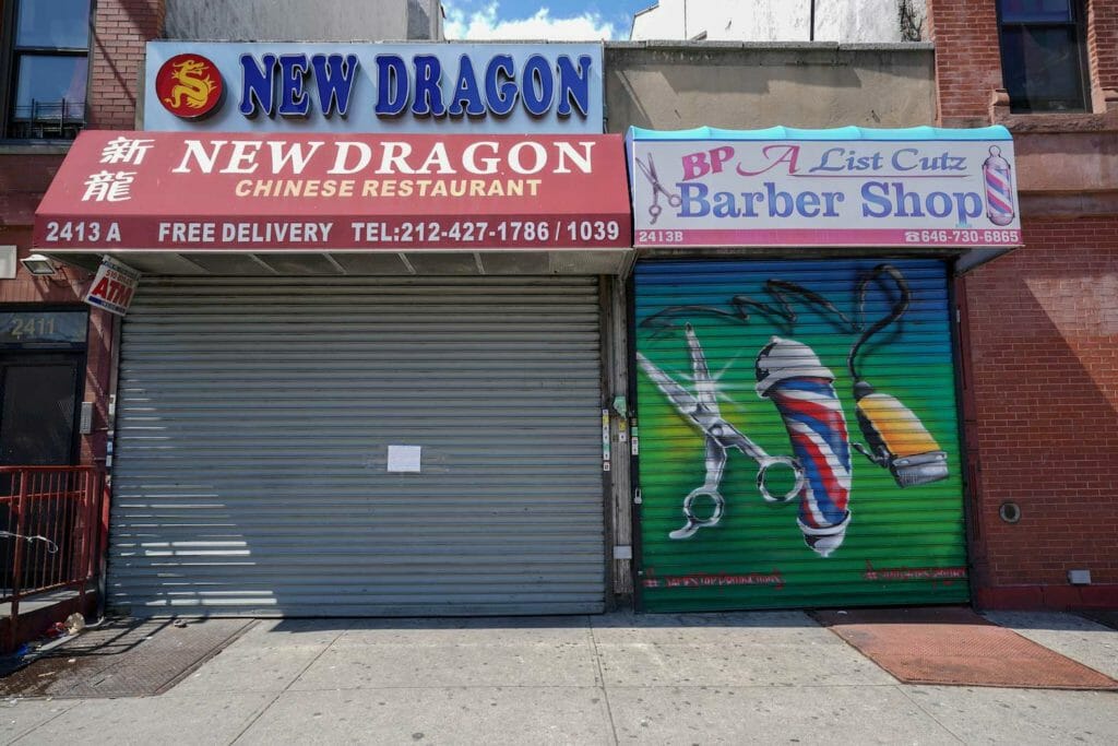 A Chinese restaurant and barber shop in Harlem are closed, as retail sales suffer record drop during the outbreak of the coronavirus disease (COVID-19) in New York City, New York, U.S., April 15, 2020. REUTERS/Bryan R Smith/