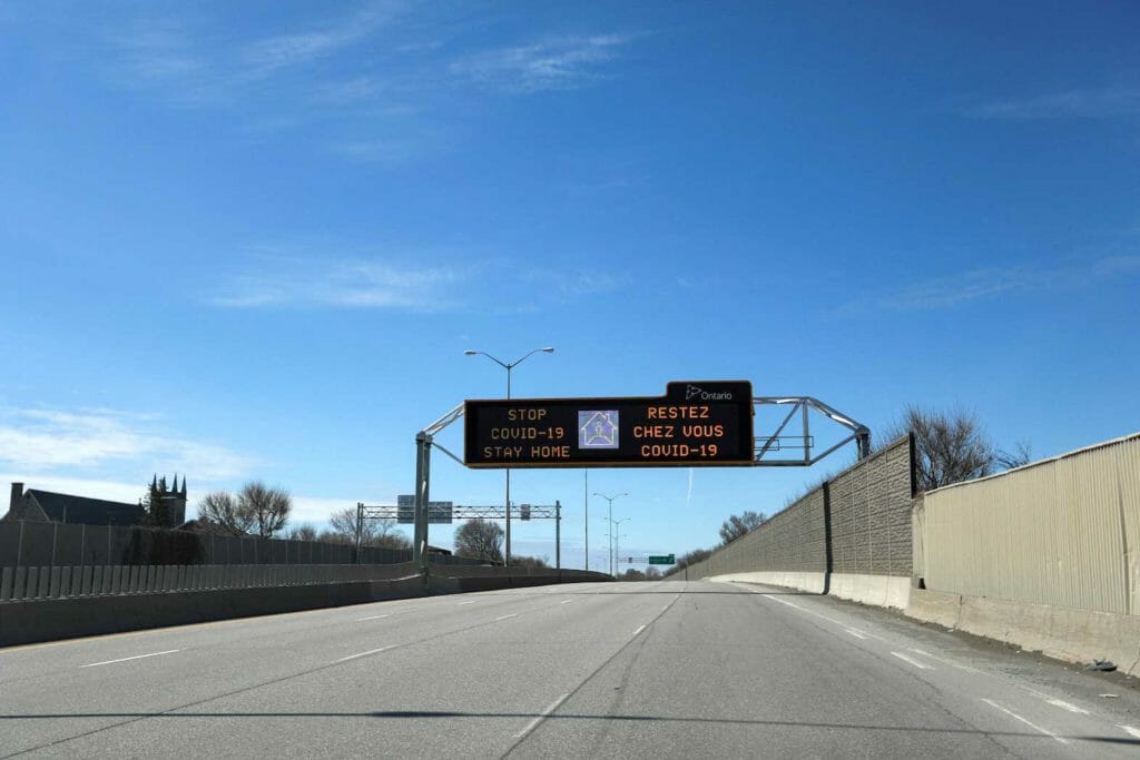  A digital traffic sign is seen above an empty highway 417, as efforts continue to help slow the spread of coronavirus disease (COVID-19), in Ottawa, Ontario, Canada April 4, 2020. REUTERS/Blair Gable