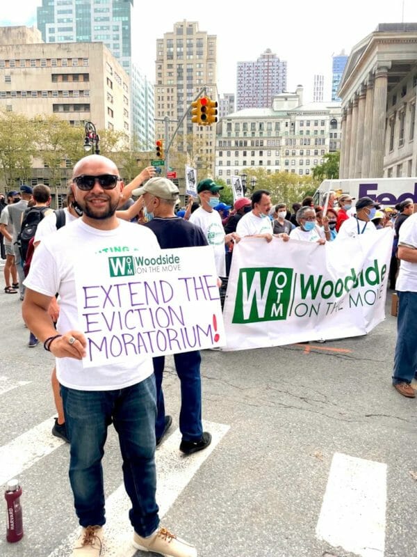 Steven Raga representing Woodside on the Move at a recent rally in NYC. (WOTM)