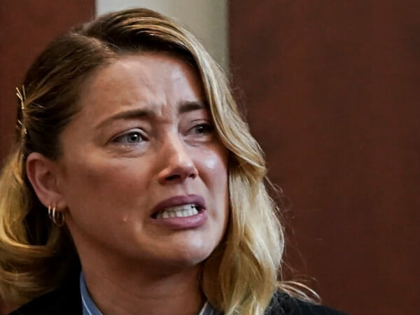 Tearful Amber Heard declares ex-husband Johnny Depp turned violent 