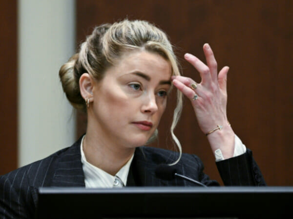 Heard's sister testifies that Johnny Depp repeatedly hit Amber Heard in the face