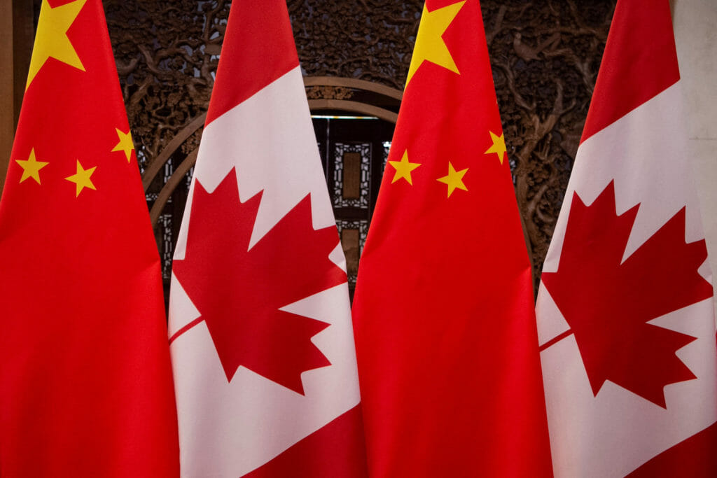 Picture of Canadian and Chinese flags taken prior to the meeting with Canada's Prime Minister Justin Trudeau and China's President Xi Jinping at the Diaoyutai State Guesthouse on December 5, 2017, in Beijing. Fred Dufour/Pool via REUTERS