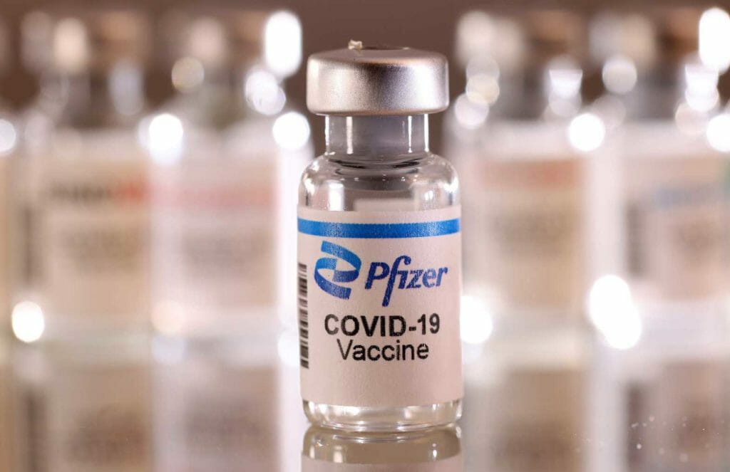 A vial labelled "Pfizer COVID-19 Vaccine" is seen in this illustration taken January 16, 2022. REUTERS/Dado Ruvic/Illustration