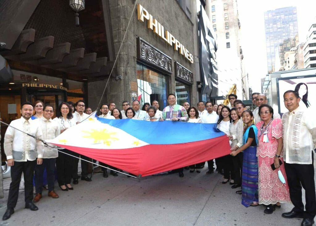 Members and leaders of the Filipino community in New York led by Consul General Elmer Cato prepare to raise the Philippine flag at the opening ceremonies of Kalayaan 2022. INQUIRER/Elton Lugay