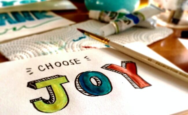 This is a notebook that reads "Choose Joy."