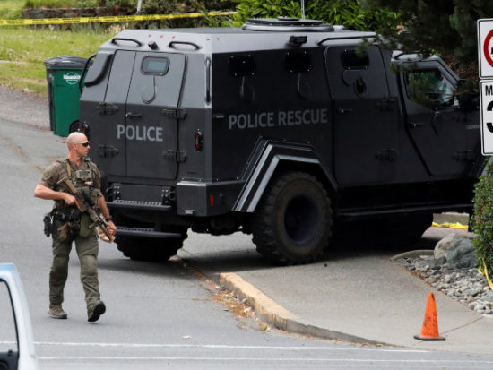 Two gunmen dead, six officers wounded in shootout at Canadian bank