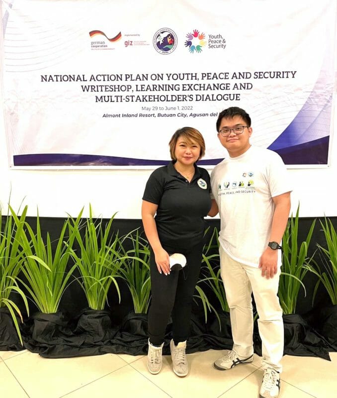 Justin Keith Baquisal, NYMWPS National Vice-Chairperson with  Vanessa Pallarco, Director of the Social Healing and Peacebuilding Department of the Office of the Presidential Adviser on Peace, Reconciliation, and Unity in Butuan city, Philippines. 