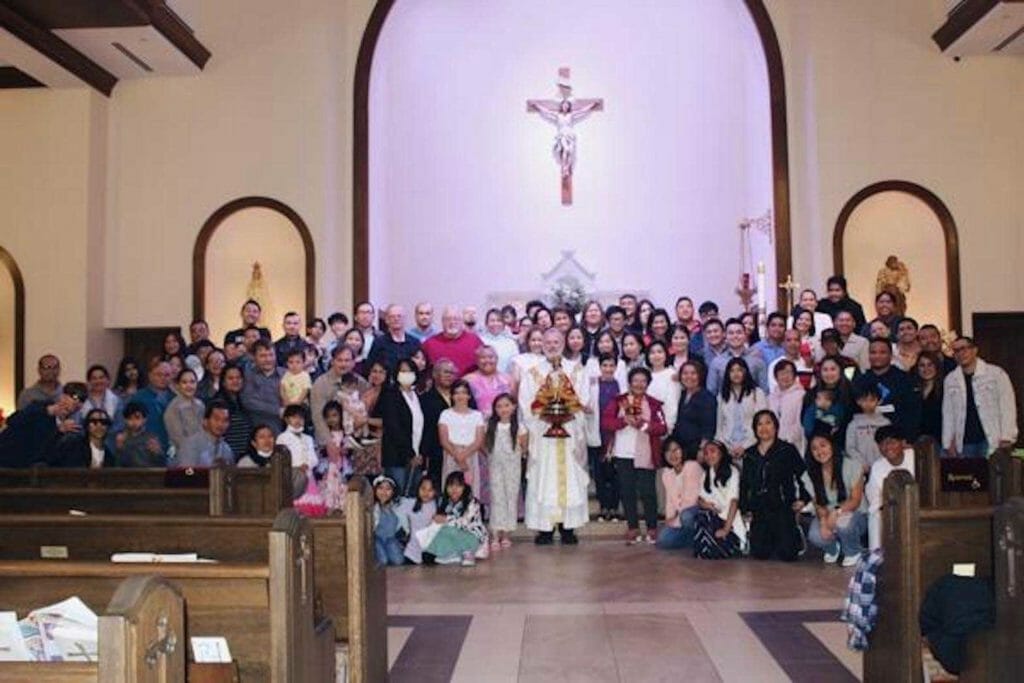  Filipino parishioners of Blessed Sacrament Church in Jonesboro in a group photo on Easter Sunday, April 17. The church holds a Filipino Mass every third Sunday of the month thanks to pastor Msgr. Scott Friend, who has been learning to speak the language. ARKANSAS CATHOLIC