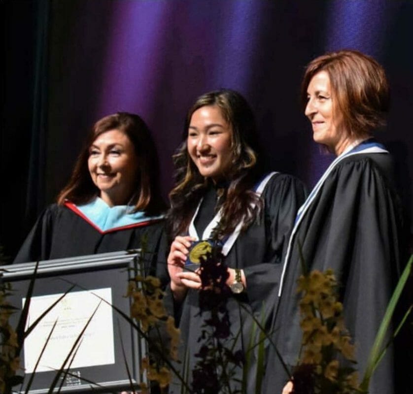 Niagara College’s top Filipina student Jonhel Patricia Lim Ampil (center) graduates at the top of her class in Canada. FACEBOOK