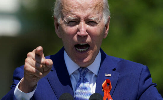 Biden pushes to ban weapons, gets pestered at gun violence event