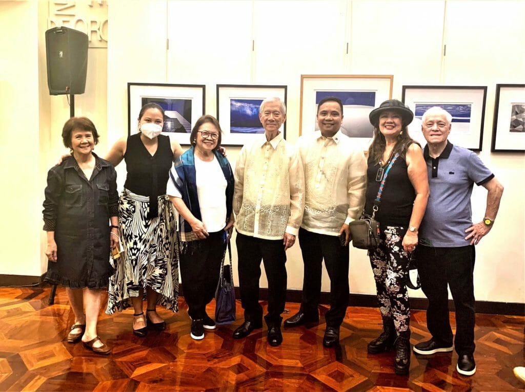 Carlos Esguerra (fourth from left) at the exhibit “Foto de Oro” presented by Deputy Consul General Arman Talbo (fifth from left), flanked by Board members of Society of Phlippine-American Artists. INQUIRER/Carol Tanjutco