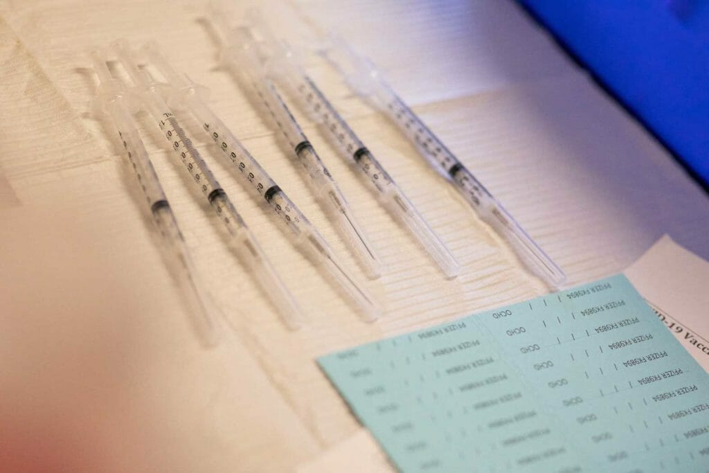 Syringes ready to be administered to residents who are over 50 years old and immunocompromised and are eligible to receive their second booster shots of the coronavirus disease (COVID-19) vaccines are seen in Waterford, Michigan, U.S., April 8, 2022. REUTERS/Emily Elconin