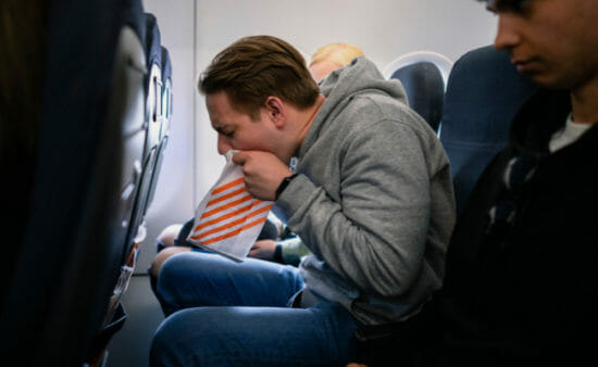 Man vomits on the plane