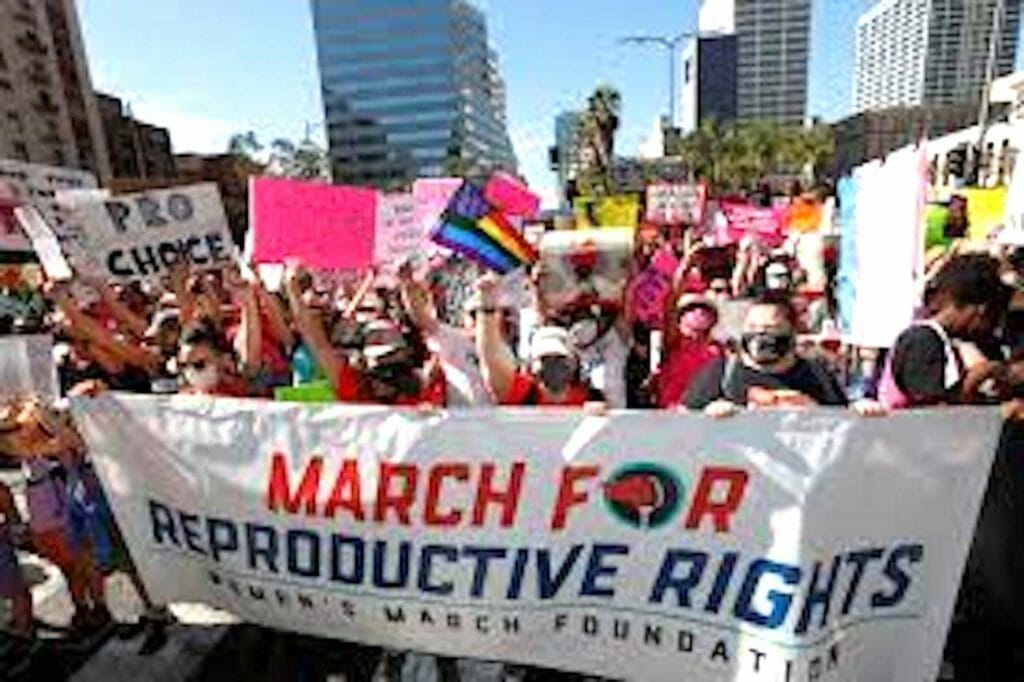  Supporters of reproductive choice take part in the nationwide Women's March, held after Texas rolled out a near-total ban on abortion procedures and access to abortion-inducing medications, in Los Angeles, California, October 2, 2021. REUTERS/Ringo Chiu
