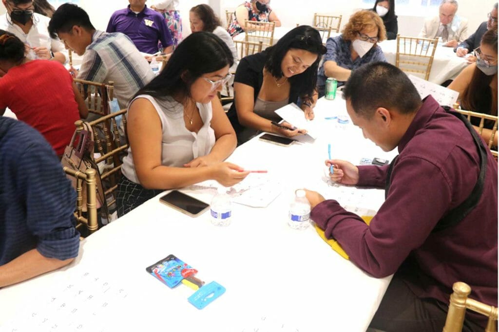 Participants try their hand at Baybayin, on writing sheets provided during the workshop led by George Taipan. CONTRIBUTED