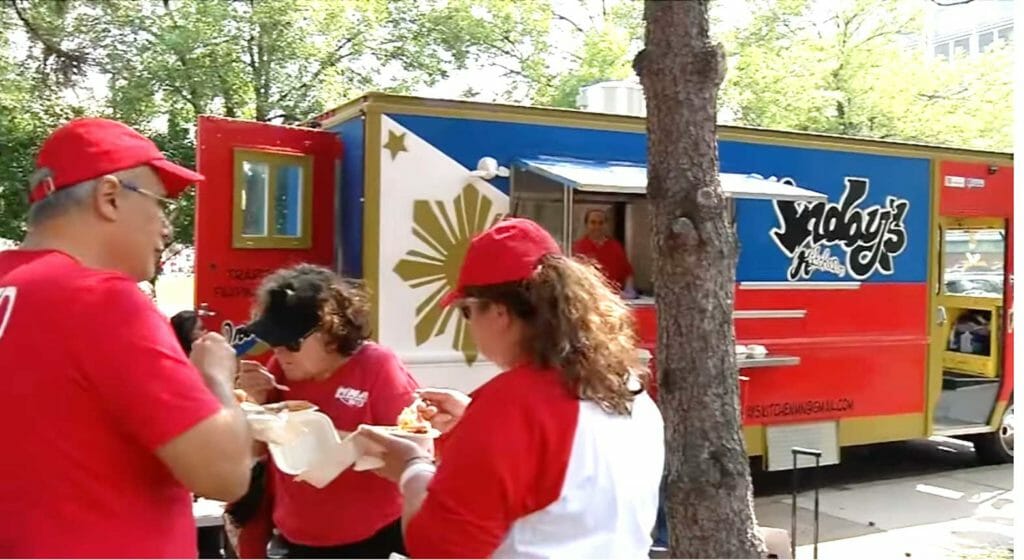 Striking nurses in Robbinsdale, Minnesota having a meal from India's Kitchen food truck. SCREENGRAB CCX MEDIA