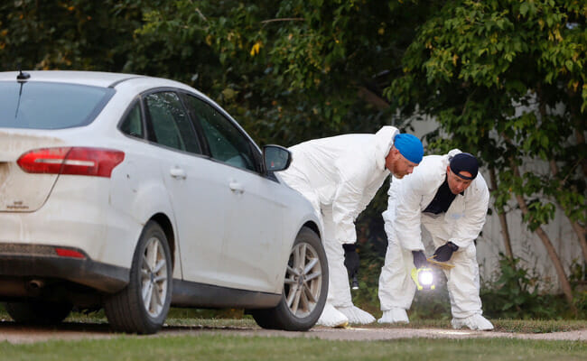 Canada knife rampage kills 10, police hunt two men