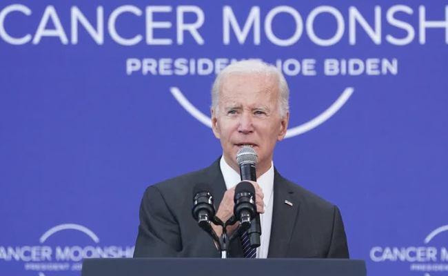 President Joe Biden signed orders on Monday to push more government dollars to the U.S. biotechnology industry, as he promoted his initiative to create new treatments and cut the death rate from cancer.