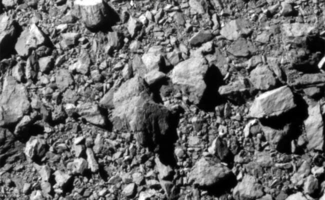 NASA's DART spacecraft slams target asteroid in first defense test