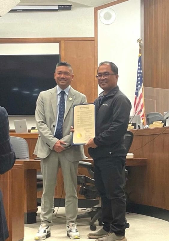Daly City Mayor Rod Daus-Magbual (L) presents the Proclamation of Domestic Violence Awareness Month (DVAM) to ALLICE 2022 president Junior Flores. (Jennifer Jimenez Wong}