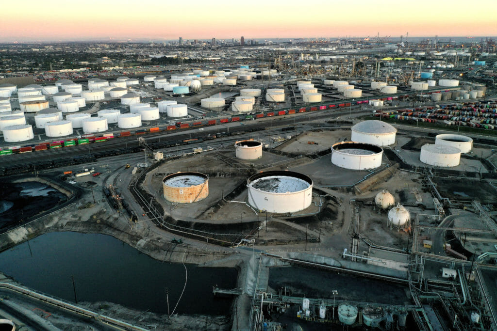 Storage tanks for crude oil, gasoline, diesel, and other refined petroleum products are seen at the Kinder Morgan Terminal, viewed from the Phillips 66 Company's Los Angeles Refinery in Carson, California, U.S., March 11, 2022. Picture taken March 11, 2022. Picture taken with a drone. REUTERS/Bing Guan/File Photo/File Photo