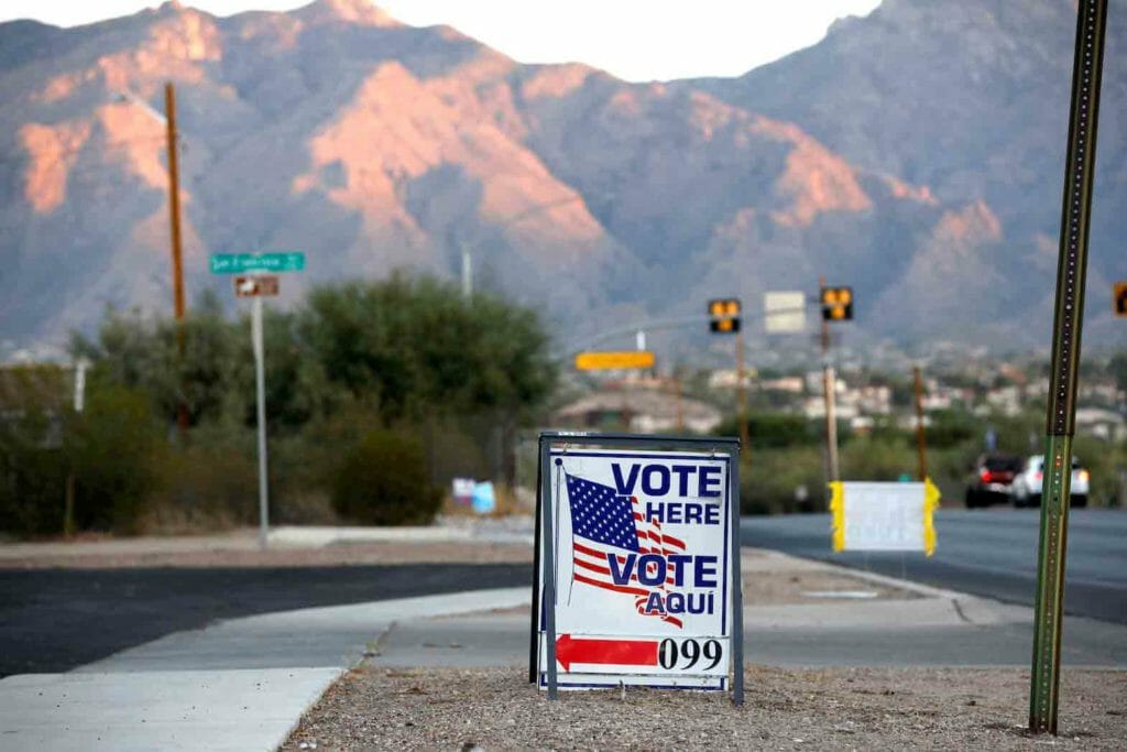 Sign directs voters to a polling station on Election Day in Tucson, Arizona, U.S. November 3, 2020. REUTERS/Cheney Orr/File Photo