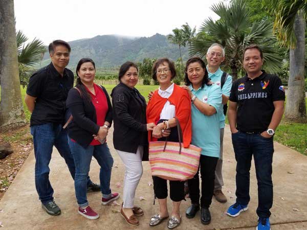 Murder victim Teresita K. Canilao (middle in red sweater) is seen here with the Philippine Consulate’s outreach team to Maui included. DFA
