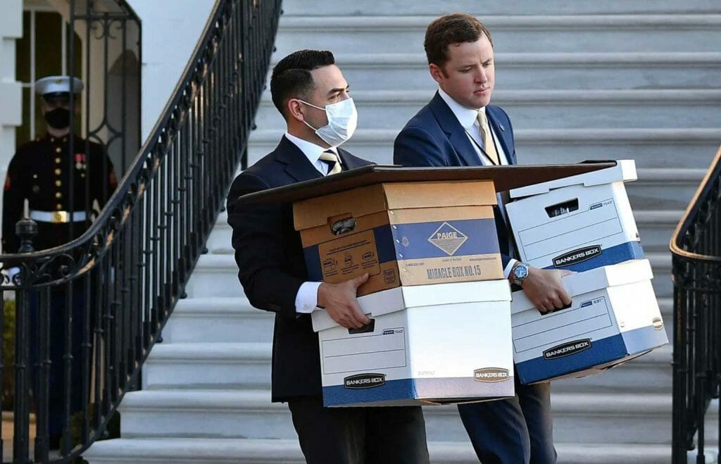 Aides carrying boxes to Marine One before former President Donald Trump left office on January 20, 2021. Trump reportedly had boxes of documents and White House mementos sent to his Mar-a-Lago estate.Photo by MANDEL NGAN/AFP Via Getty Images 