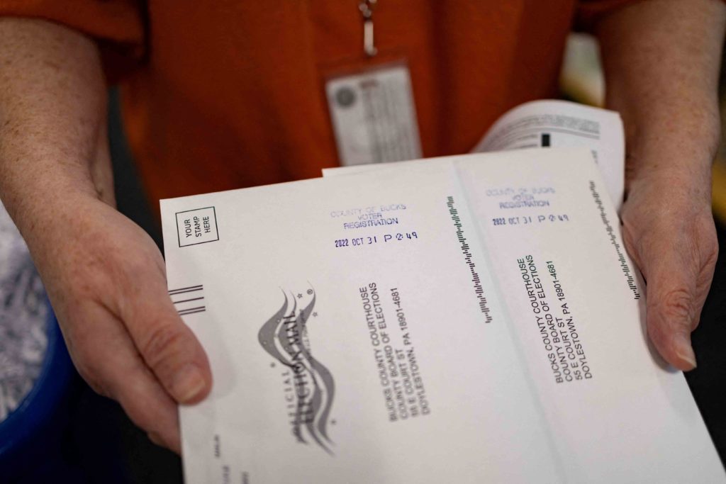 "On Demand" absentee or mail-in ballots are time stamped after being filled out in Doylestown, Pennsylvania, U.S. October 31, 2022. REUTERS/Hannah Beier/File Photo