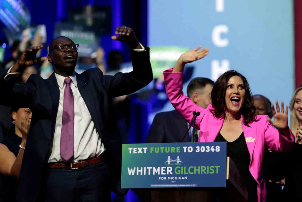 Democratic Michigan Governor Gretchen Whitmer and Lieutenant Governor Garlin Gilchrist react during her 2022 U.S. midterm elections night party in Detroit, Michigan, U.S., November 9, 2022. REUTERS/Rebecca Cook