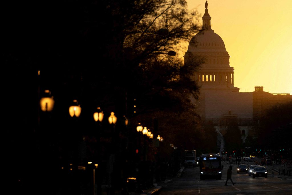 The sun rises over the U.S. Capitol, as control of Congress remained unclear following the 2022 U.S. midterm elections in Washington, U.S., November 9, 2022. REUTERS/Tom Brenner/File Photo