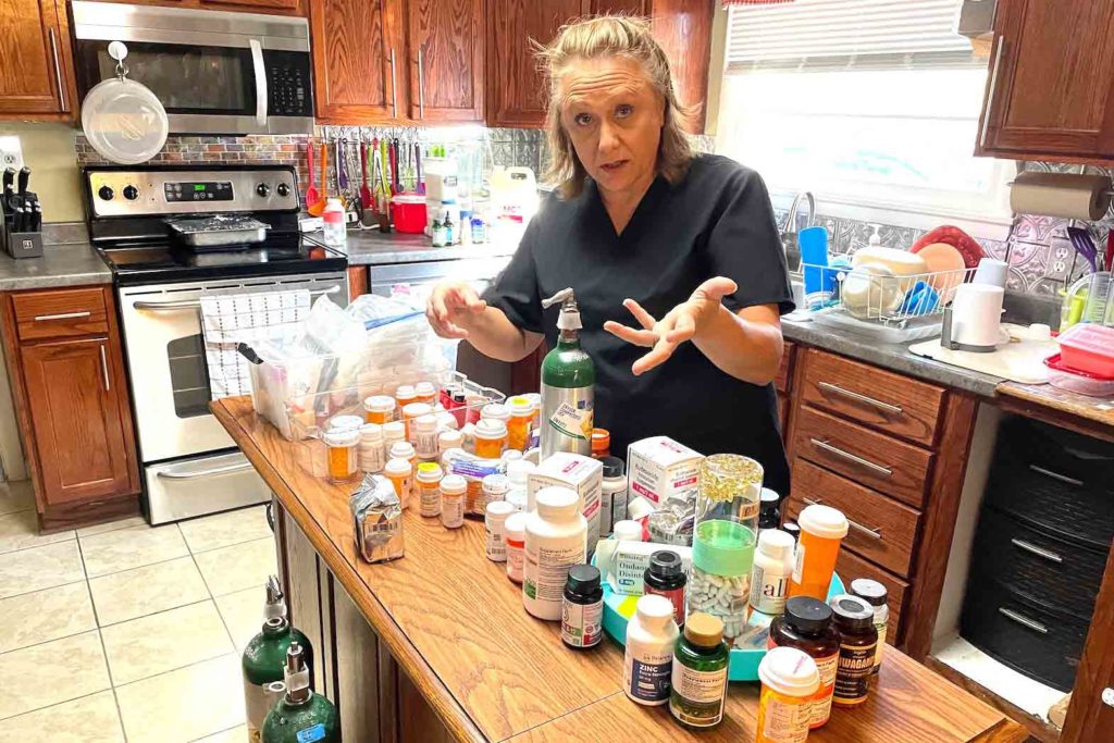 Cinde Lucas, whose husband has suffered from long Covid, lists the many supplements and prescription medications he tried while looking for something to combat brain fog, depression, and fatigue. (Blake Farmer / WPLN News)