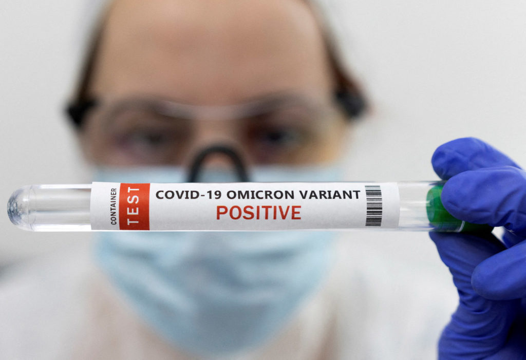 Test tube labelled "COVID-19 Omicron variant test positive" is seen in this illustration picture taken January 15, 2022. REUTERS/Dado Ruvic/Illustration/File Photo