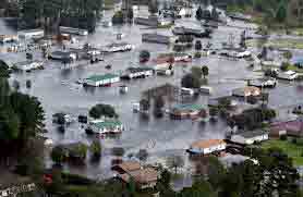 Houses sit in floodwater caused by Hurricane Florence, in this aerial picture, on the outskirts of Lumberton, North Carolina, U.S. September 17, 2018. REUTERS/Jason Miczek